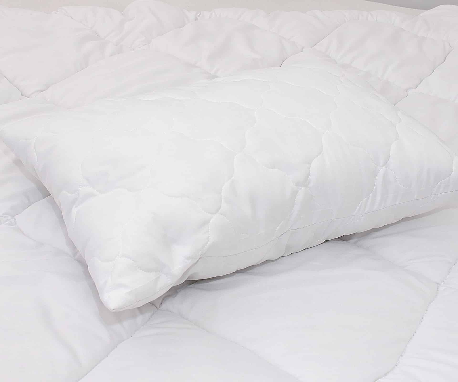 Ковдри та Подушки